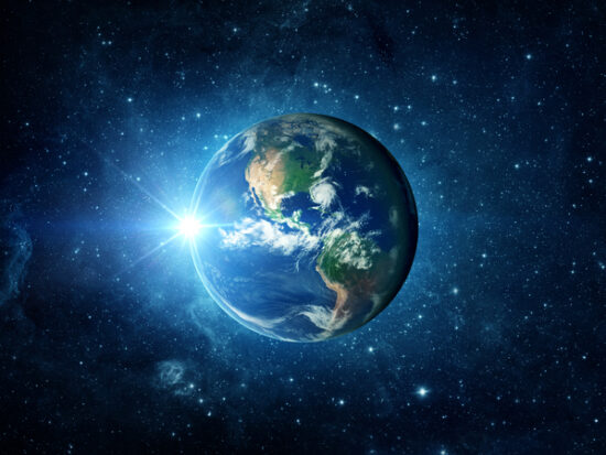 Panoramic view of the Earth, sun, star and galaxy. Sunrise over planet Earth, view from space.