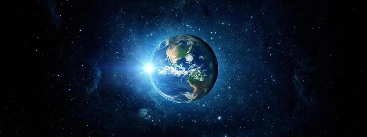 Panoramic view of the Earth, sun, star and galaxy. Sunrise over planet Earth, view from space.