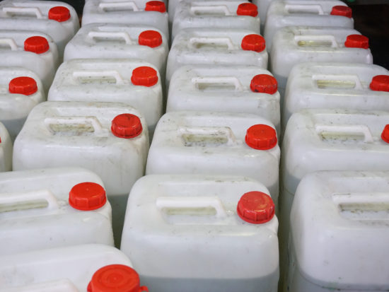 Plastic jugs of chemicals