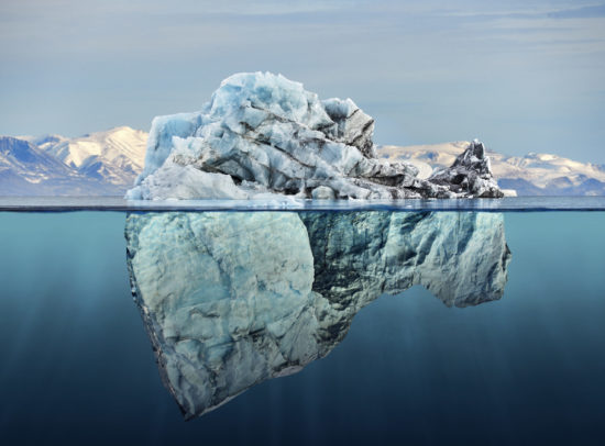 iceberg with above and underwater view