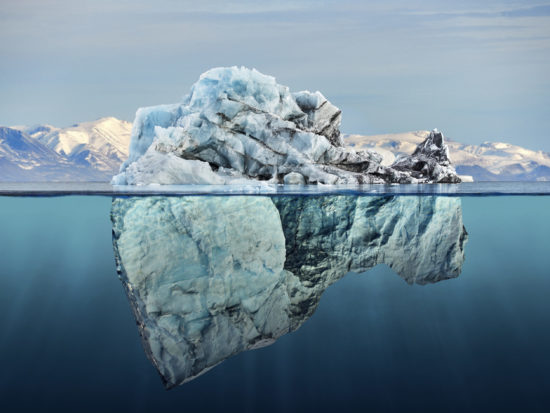 iceberg with above and underwater view