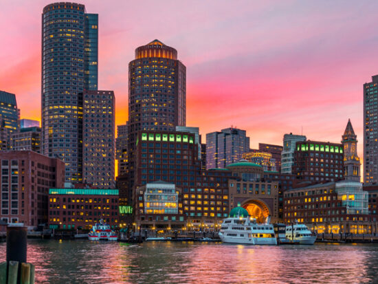 Boston,Skyline,And,Fort,Point,Channel,At,Sunset,As,Viewed