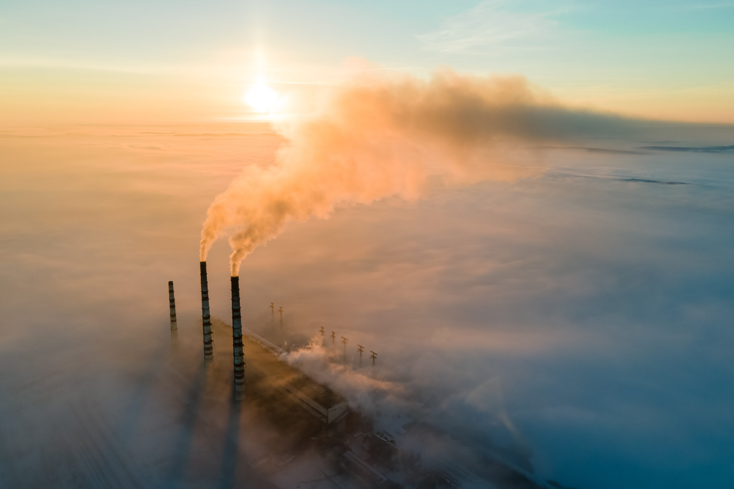 Aerial,View,Of,Coal,Power,Plant,High,Pipes,With,Black