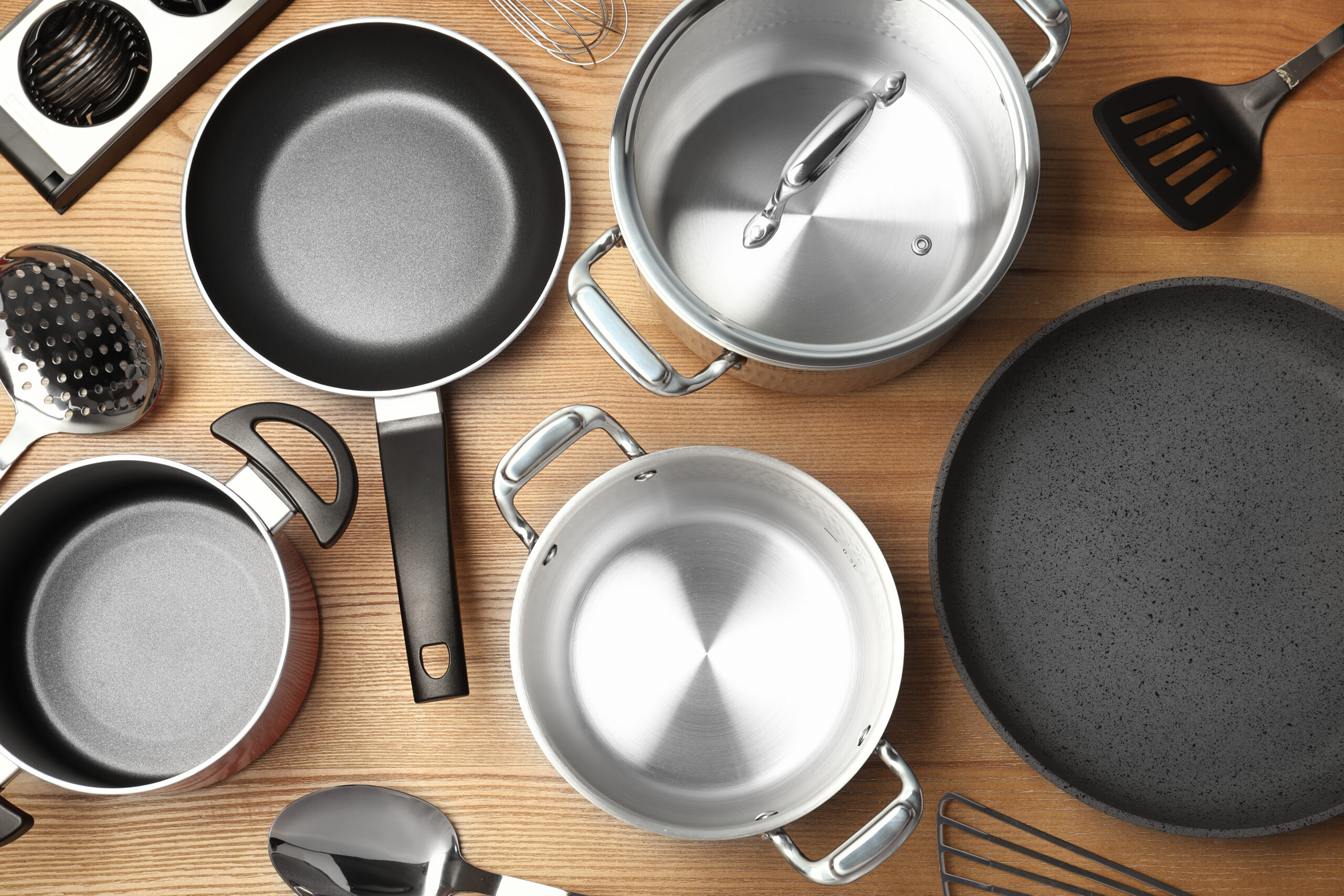 Flat,Lay,Composition,With,Clean,Cookware,On,Wooden,Background