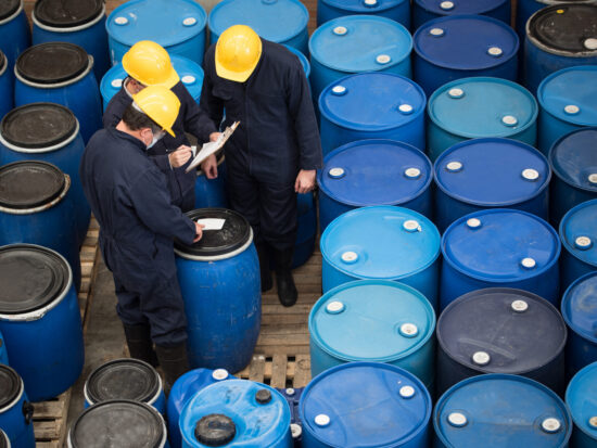 Men working at a chemical warehouse